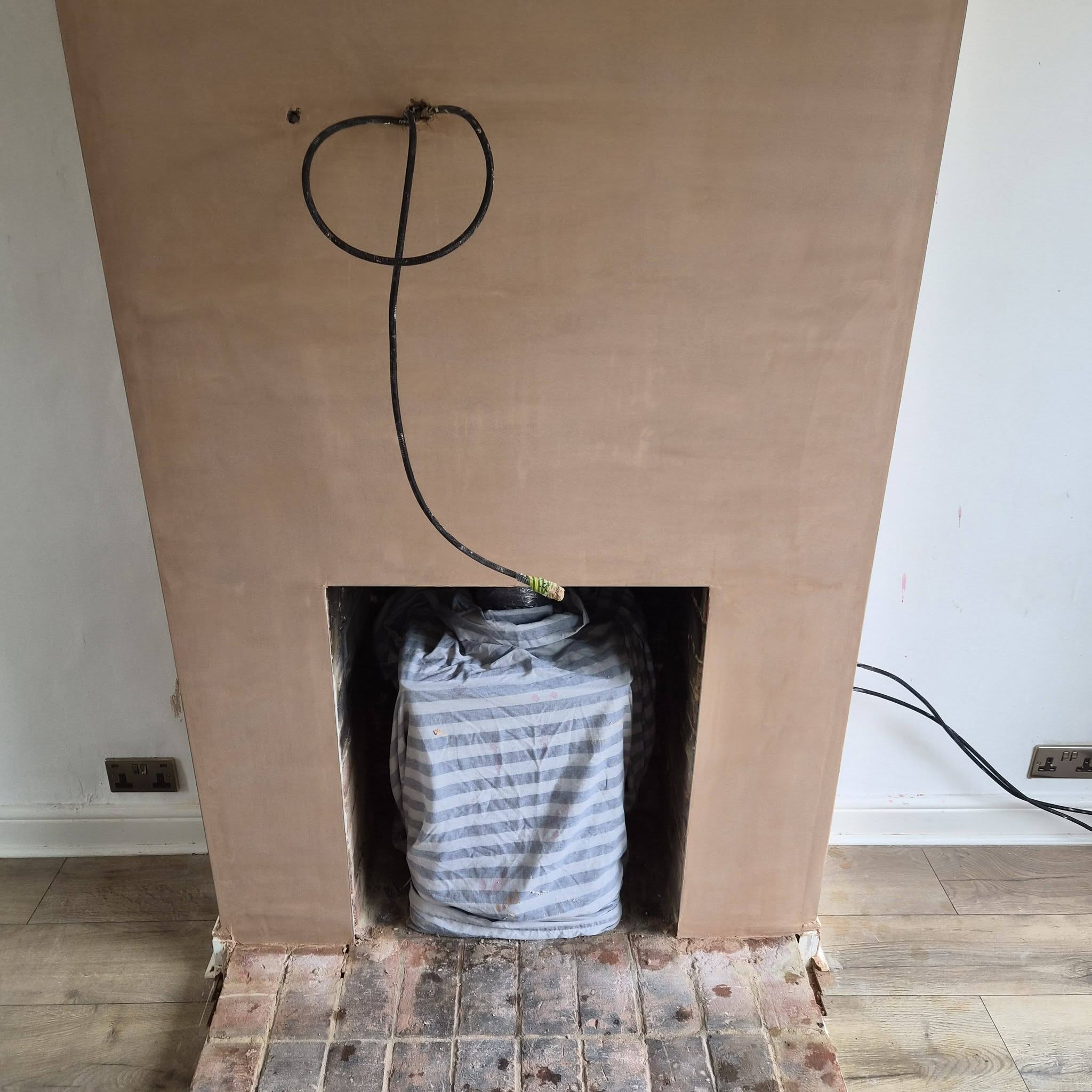 Fireplace re-plaster